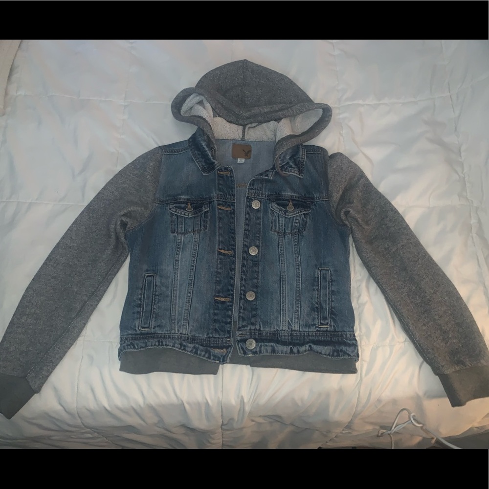 American Eagle denim jacket with gray sweatshirt sleeves and hoodie.